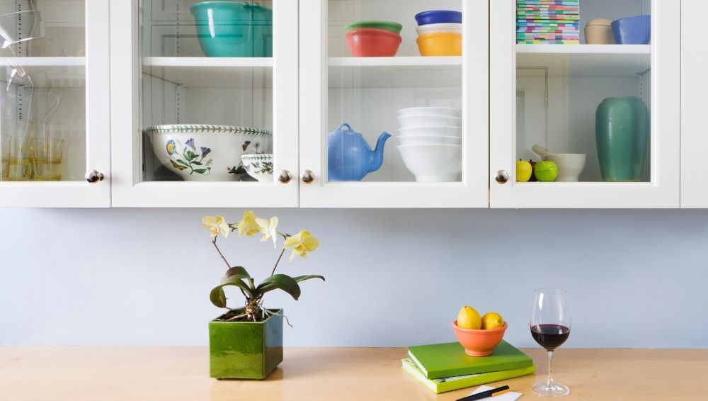 Place heavier items on the bottom of cabinet